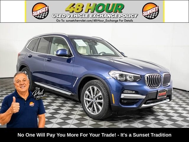 2019 BMW X3 xDrive30i in Phytonic Blue Met — front three-quarter view